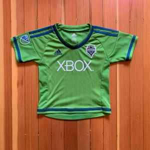 Official MLS toddler size 2T Seattle Sounders jerseys.